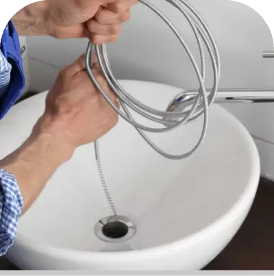 Plumber Working On Sink