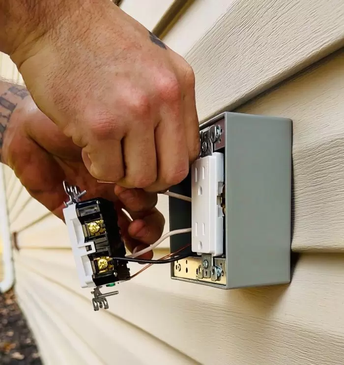 Electrician Installing Outdoor Gfci Outlet Gray Box Siding Wiring Screwdriver